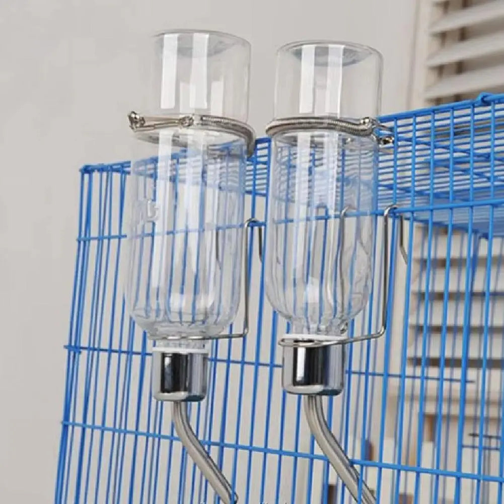 Distributeur d'eau 350ml à suspendre pour lapins. Facile à fixer sur toutes les cages.